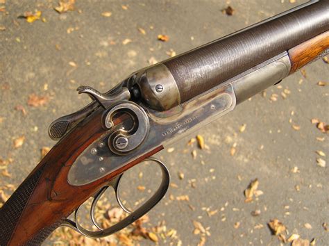 A magnifying glass. . Remington 1889 hammer gun parts